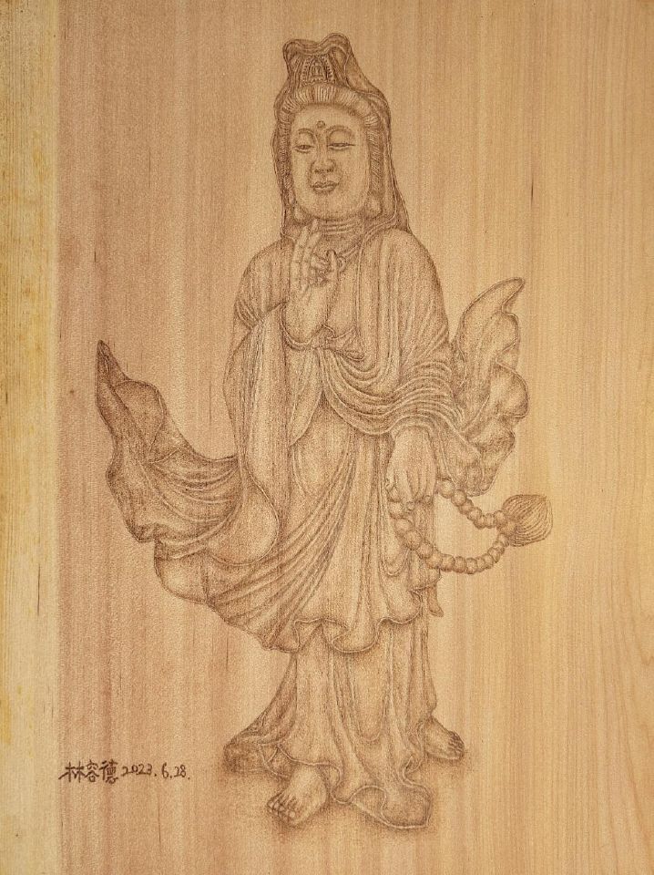 木材烙畫，表現出台灣民眾最具有宗教信仰的神明意象 Wood pyrography, showing the most religious image of the gods in Taiwan